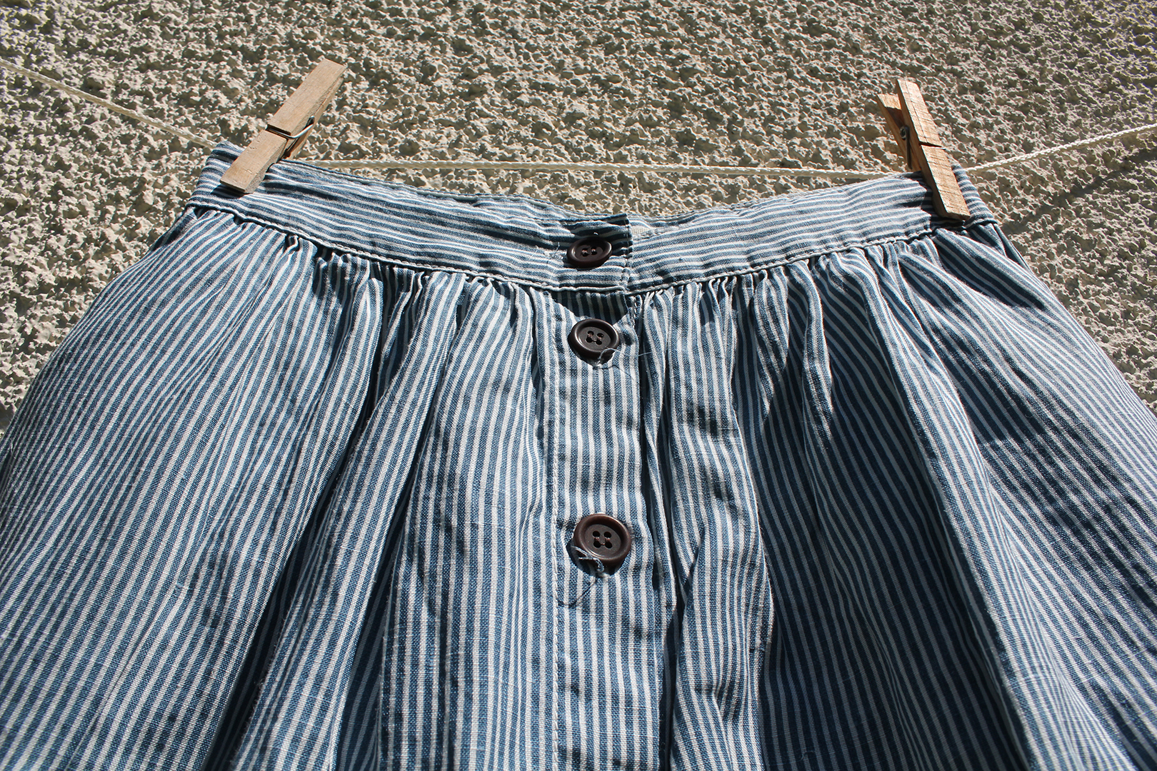 medium long striped skirt with front buttons